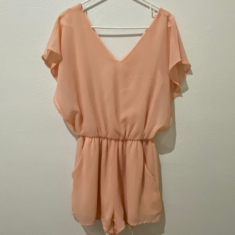 Blush pink flutter sleeve romper